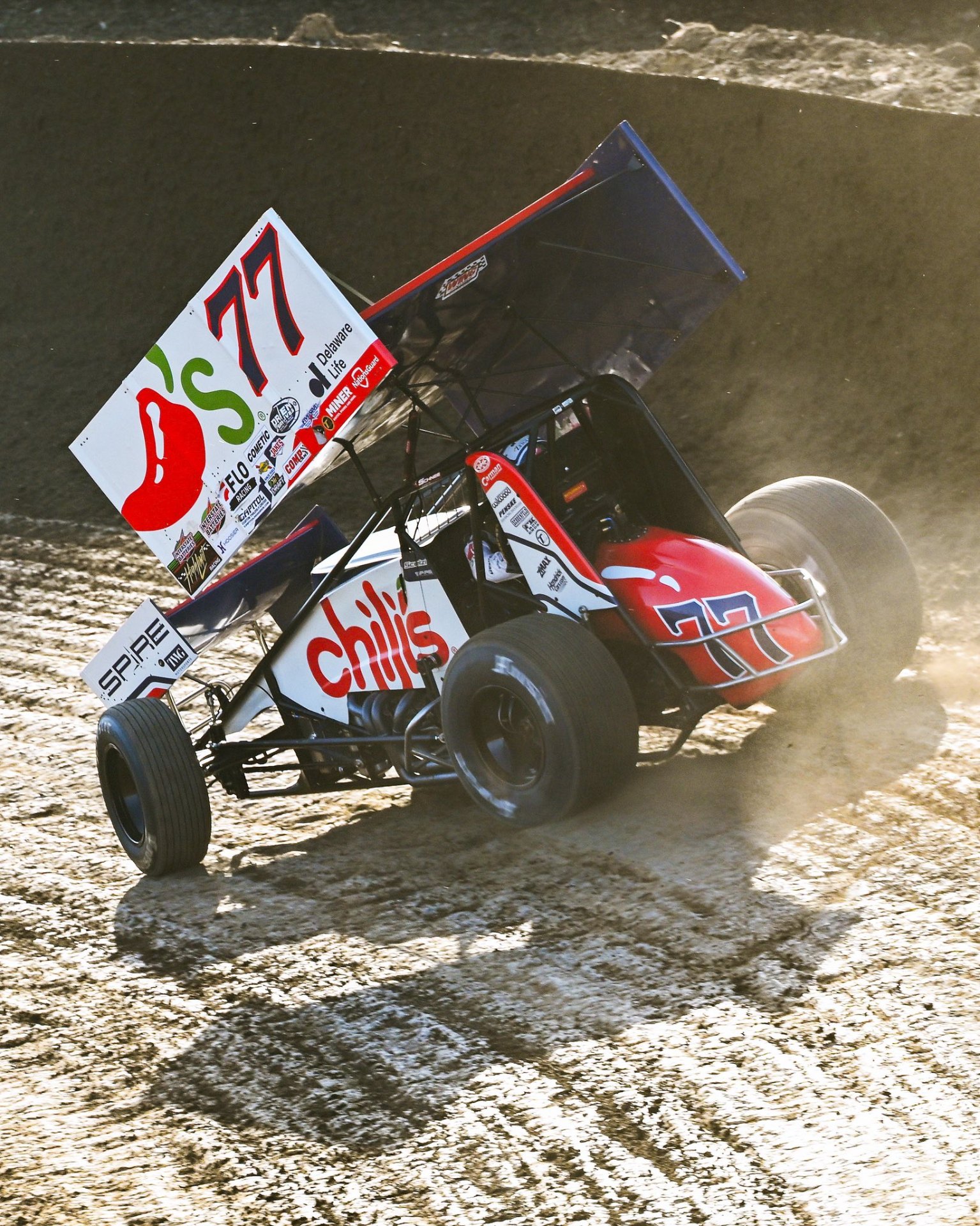 Spire Motorsports No. 77 Chili's sprint car on dirt